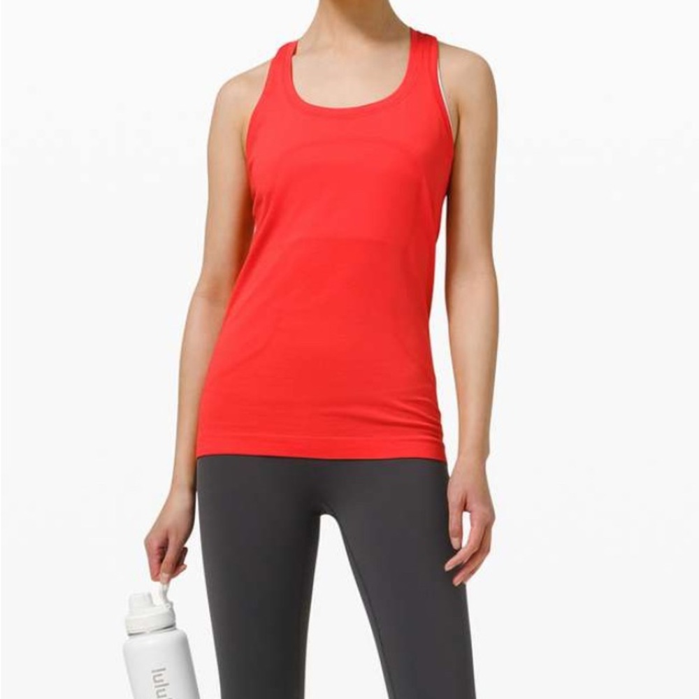 Lululemon racer back tank top. In ‘pink punch’. Size 4. With tags.